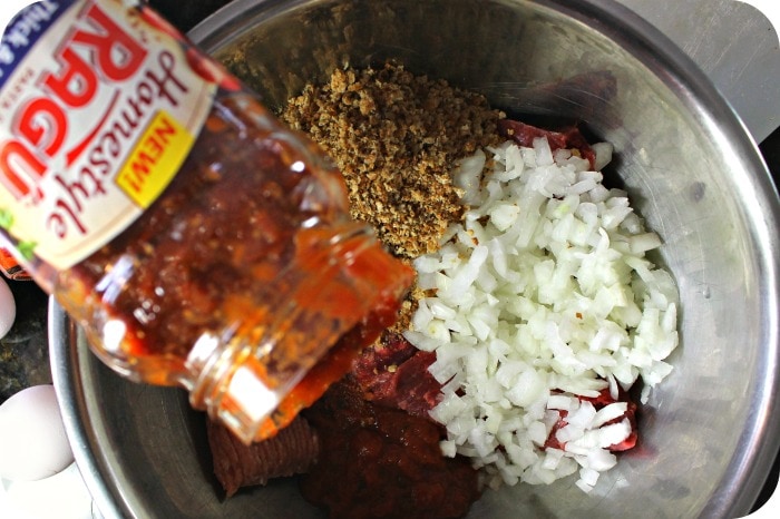 Italian meatloaf pouring sauce