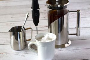 Cappuccino with steamed milk in microwave